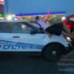 Detroit-Police-Drive-Through-Protest-Mob-Screen-Image-06282020-600×335-2